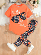 2pcs Girls' Clothing Party Slogan Large Glasses Print Pattern Drop Shoulder Irregular Hem Design Loose Short Sleeve T-Shirt + Floral Print Skinny Nine-Tenths Bottoms Set Girls' Summer Outfit Holiday Gift Girls' Fashion Casual - The Superior Findings Depot