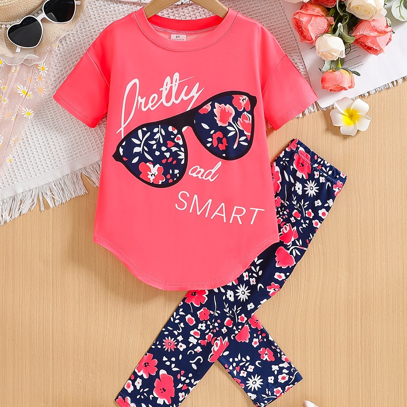 2pcs Girls' Clothing Party Slogan Large Glasses Print Pattern Drop Shoulder Irregular Hem Design Loose Short Sleeve T-Shirt + Floral Print Skinny Nine-Tenths Bottoms Set Girls' Summer Outfit Holiday Gift Girls' Fashion Casual - The Superior Findings Depot